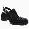 Justine Clenquet Mules à clous Raf noir