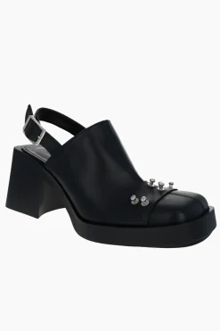 Justine Clenquet Mules à clous Raf noir